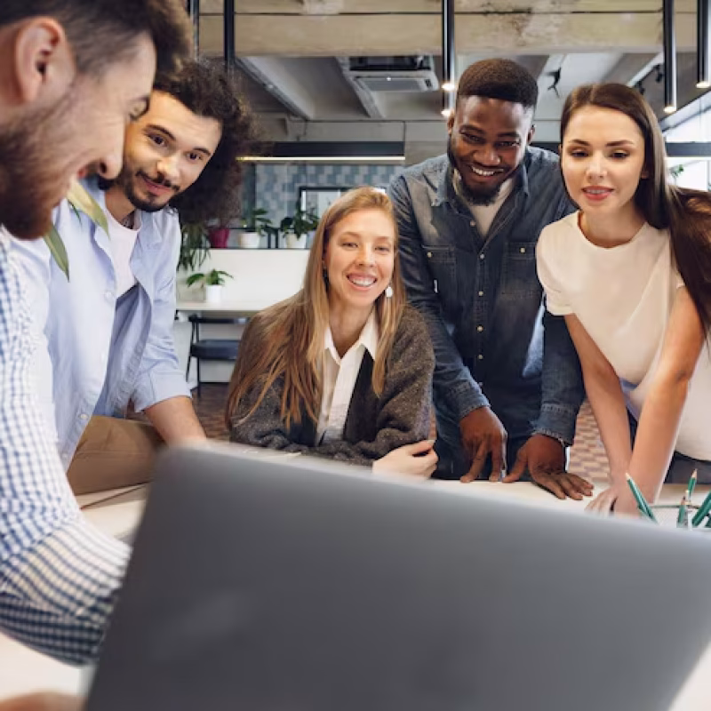 team-diverse-coworkers-modern-office-discuss-their-project-together_93675-134767